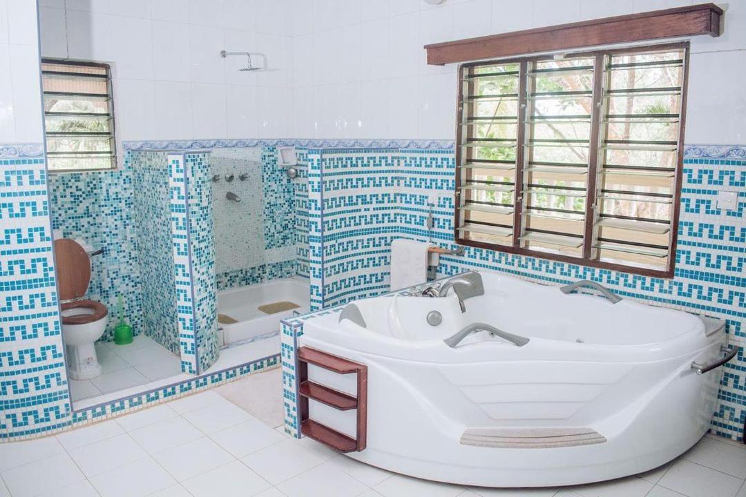 Kijani Cottages Diani เดียนีบีช ภายนอก รูปภาพ