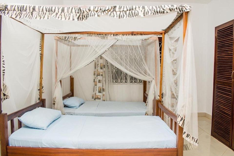 Kijani Cottages Diani เดียนีบีช ภายนอก รูปภาพ